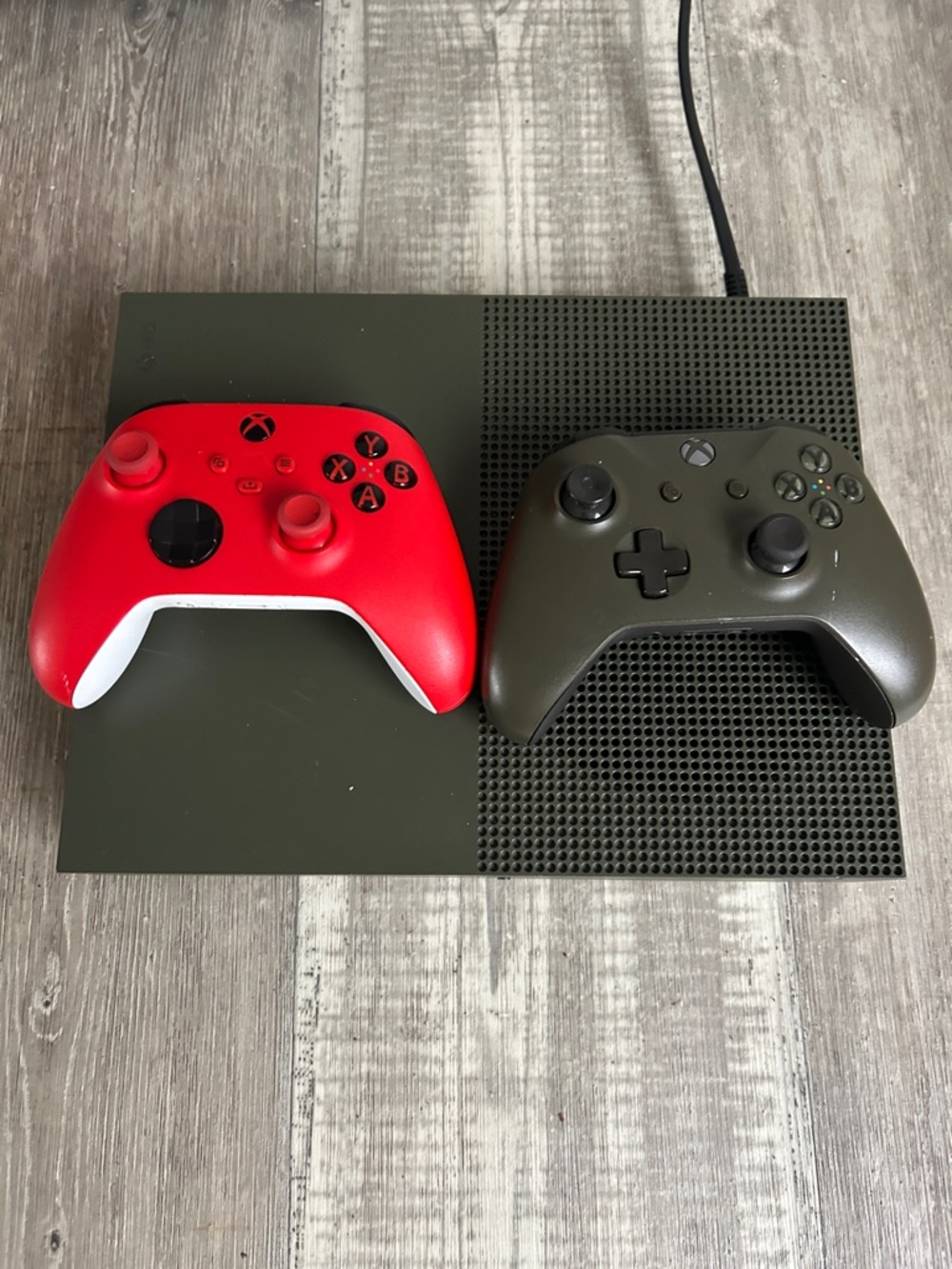 Xbox one s Console with Red and Olive Green Wireless Controllers